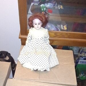 Vintage Doll with Polka Dot Dress and Auburn Hair